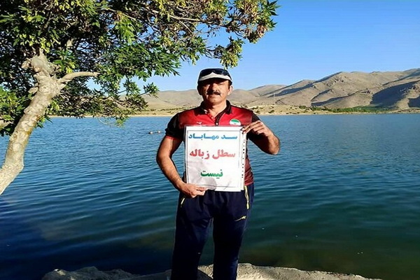 Boats and environmental activists cleared the margins of the Mahabad dam